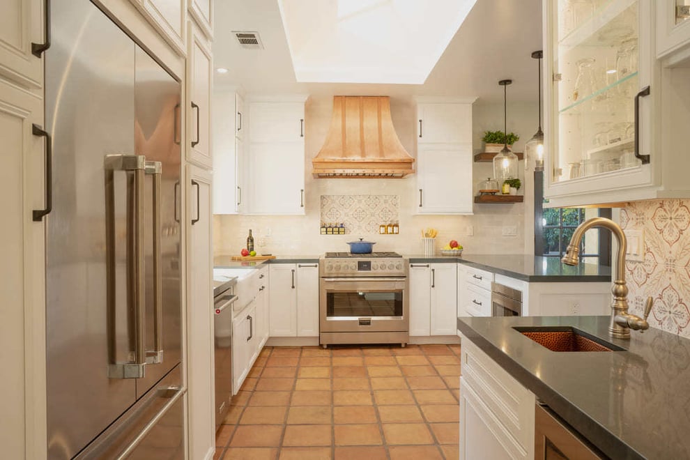 Kitchen remodel in Fresno with copper hood by Imagine Remodeling