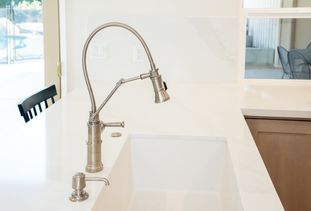 Integrated sink design on countertop by Imagine Remodeling