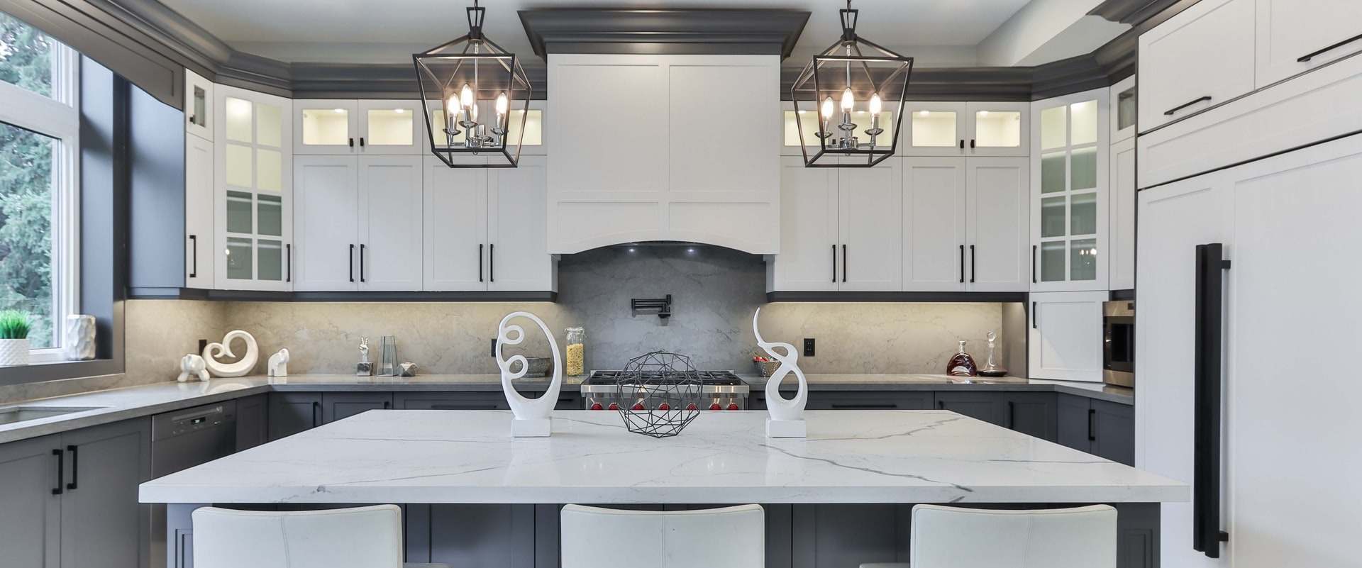 modern kitchen renovation with slab backsplash