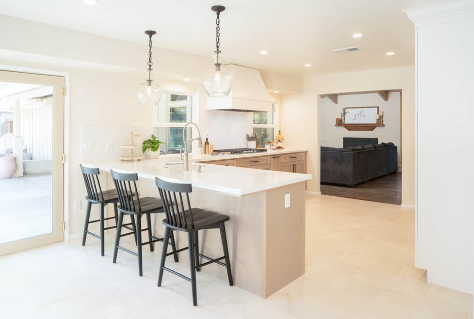 warm white and beige colored kitchen with range hood ideas